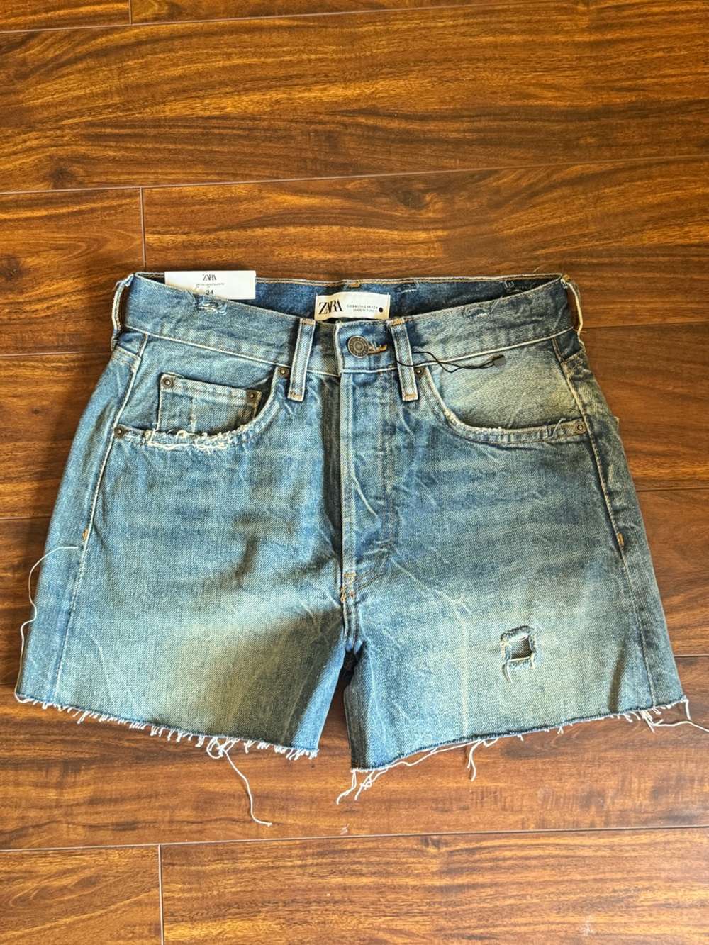 Zara Light Blue Distressed Denim Shorts